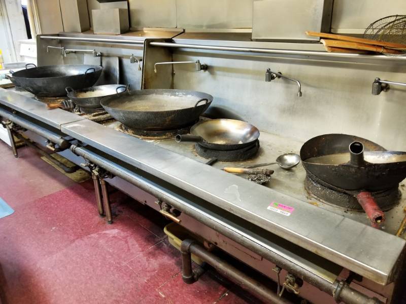 lot 9869 image: 8 WOK Pans