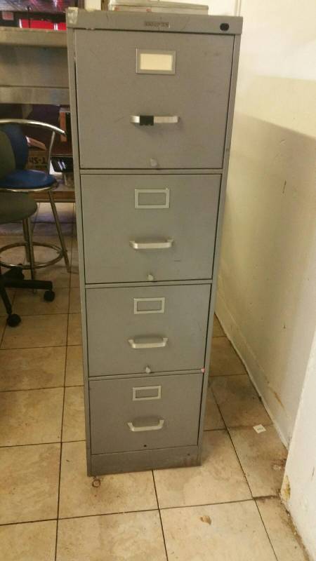 lot 9880 image: File Cabinet and Fake Plant