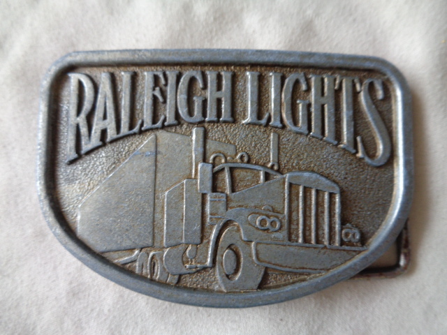 lot 6571 image: Raleigh Lights Belt Buckle
