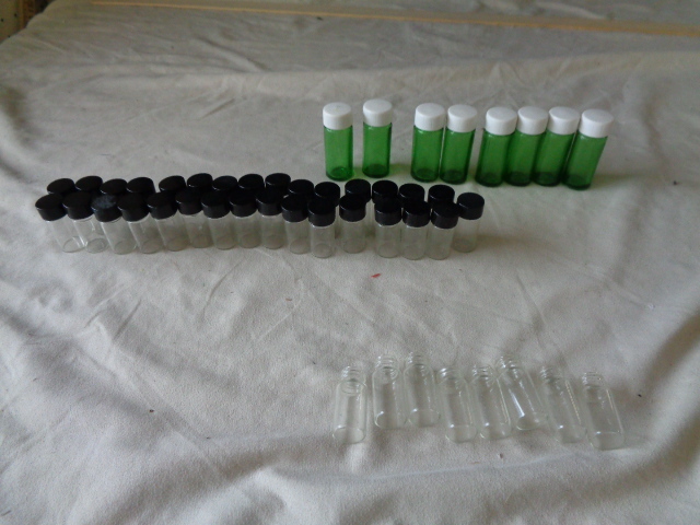 lot 6613 image: little glass bottles