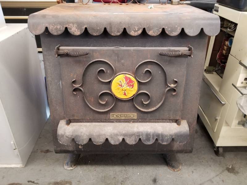 lot 3763 image: Wood Burning The Earth Stove