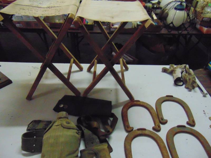 lot 10723 image: US Army Canteen, Hat, 4 Horse shoes, and more