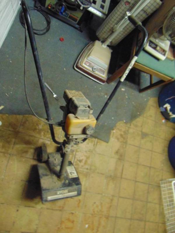 lot 10728 image: Ryobi 31cc Gas Tiller