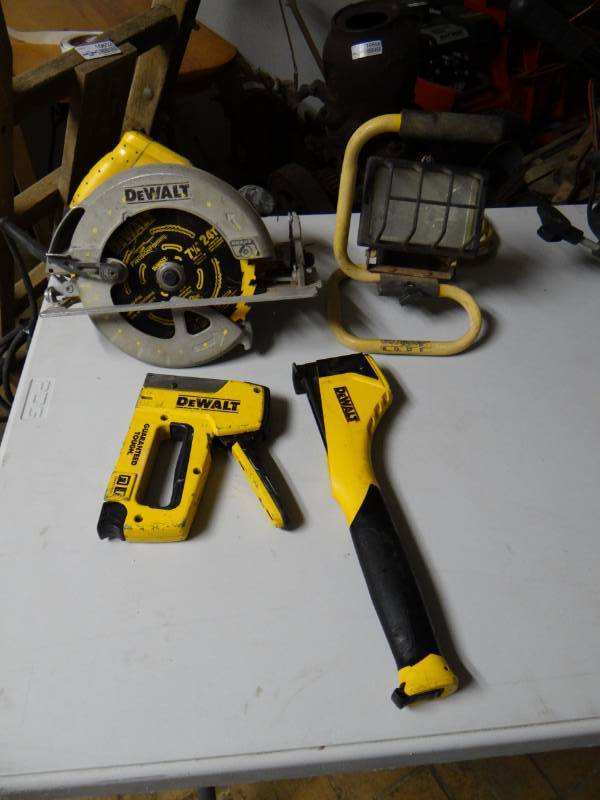lot 10674 image: Dewalt Power Circular Saw, Roofing Slap-tacker, Stapler, and Work light