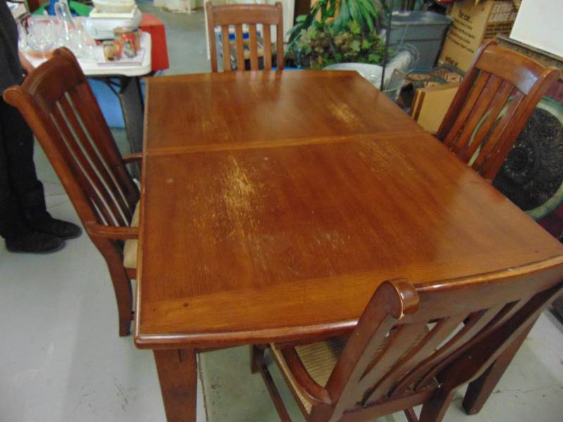 lot 10675 image: Vintage Table with pistol drawer and 4 Padded Arm chairs