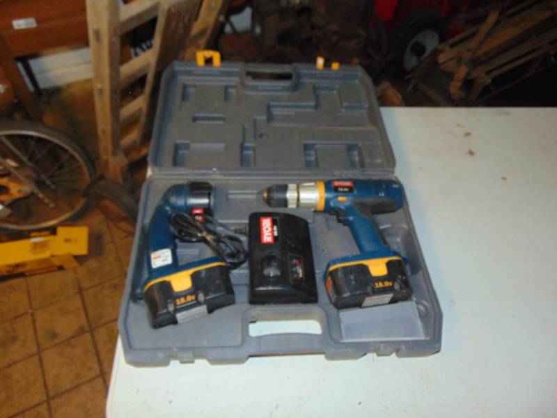 lot 10691 image: Ryobi 18 Volt Battery Powered Drill and Flash light with Charger and Case