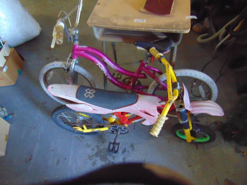 lot 10772 image: Boys Moto Bicycle and Girls Bike