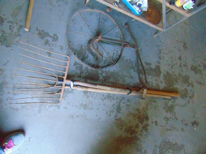 lot 10781 image: 3 Pitch Forks, and Antique Plow Wheel