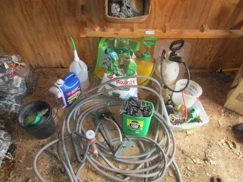 lot 13342 image: Garden Hoses and Yard Chemicals Lot