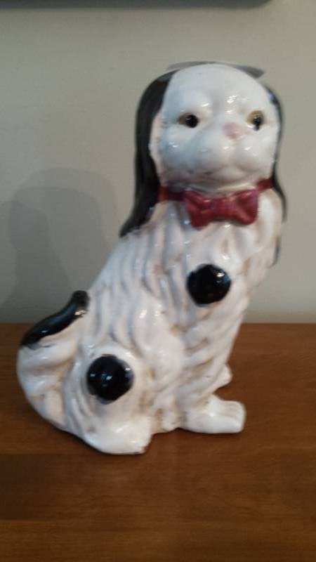 lot 134060 image: Staffordshire Black  White Ceramic Dog Statue