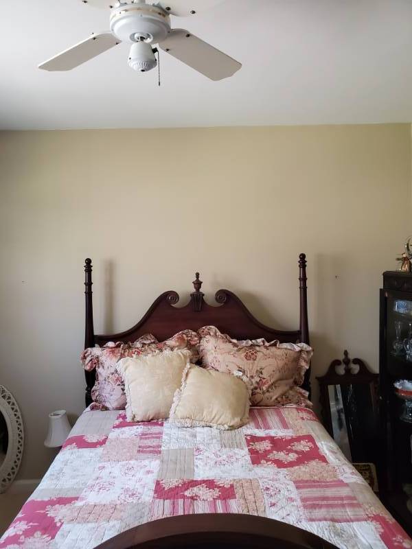 lot 13436 image: Full Sized Four Post Bed Frame Mattress and Box Springs