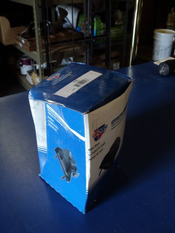 lot 7217 image: (1) Car Quest Premium Engine Parts Motor Mount 9156, box is damaged but mount is unaffected