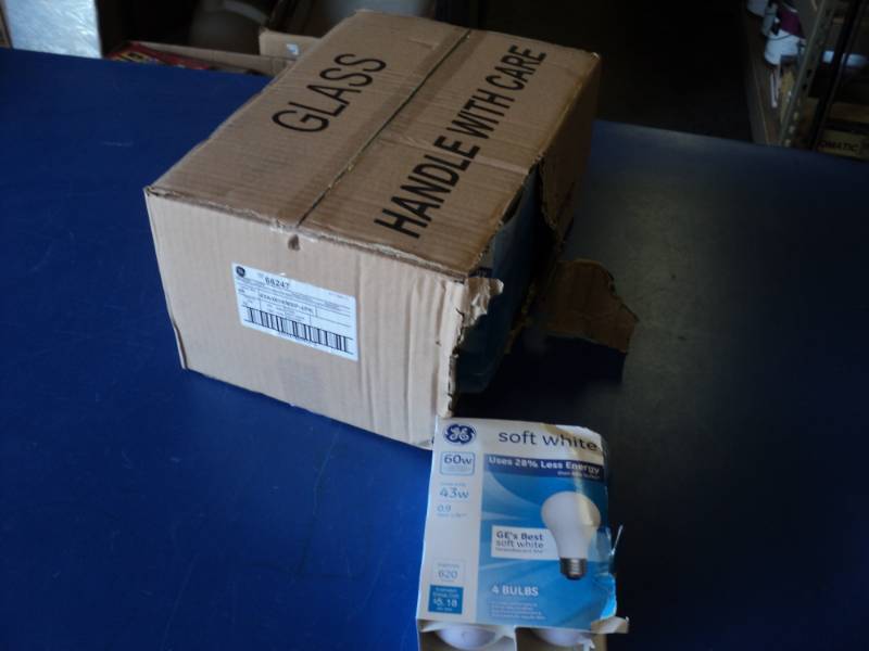 lot 7266 image: (1) Case GE Halogen Lamps 60 W Soft white bulbs, (12) pkgs of 4  48 bulbs total