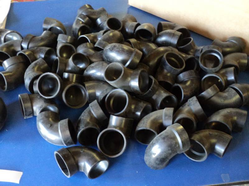 lot 7272 image: (55) ct. lot Charlotte Plastic pipe elbows, 2 ID, black