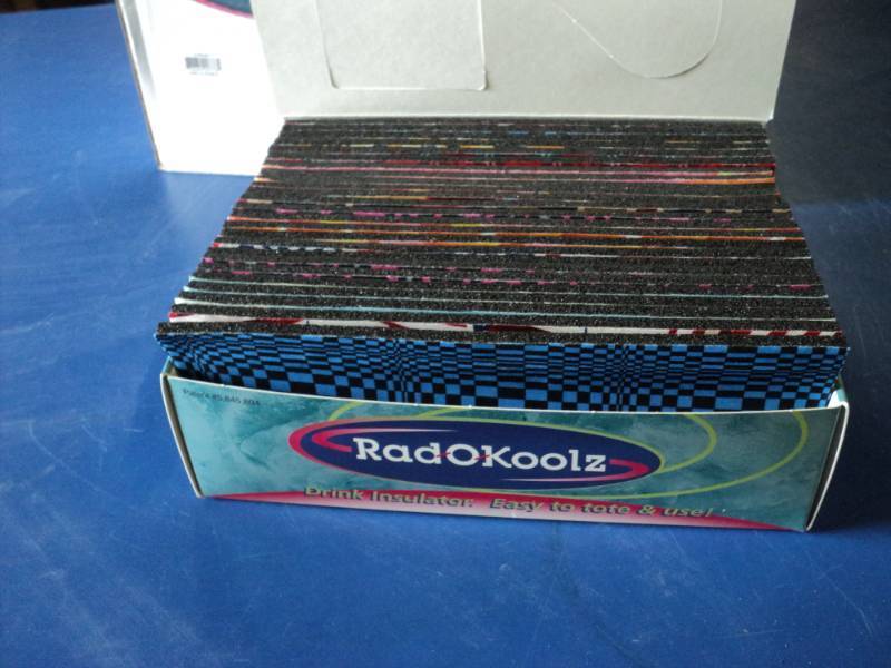lot 7383 image: (1) case Rad-O-Koolz drink insulators, (6) boxes of (25) foam with bendable metal 9-18 x 3-38, fits around a standard soda can or bottle