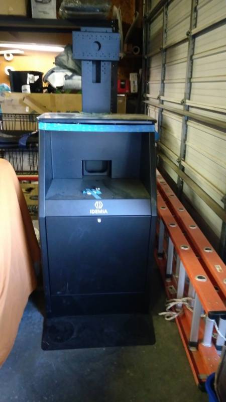 lot 7404 image: Idemia Brand Metal and Plastic Cabinet, approx 25 x 30 base plate, 66 tall, 25 x 23 stand, lock-able drop out bin w (2) keys, TV mount, slid out keyboard tray