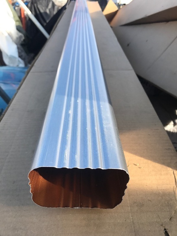 lot 108 image: Two new 10 foot long guttering downspouts as pictured