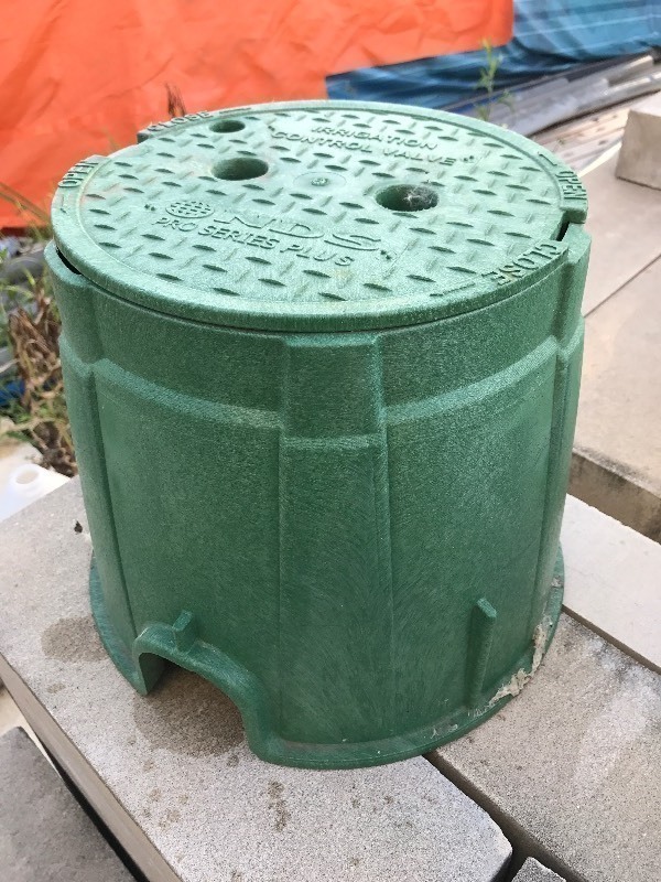 lot 148 image: In ground sprinkler system valve box or use your imagination
