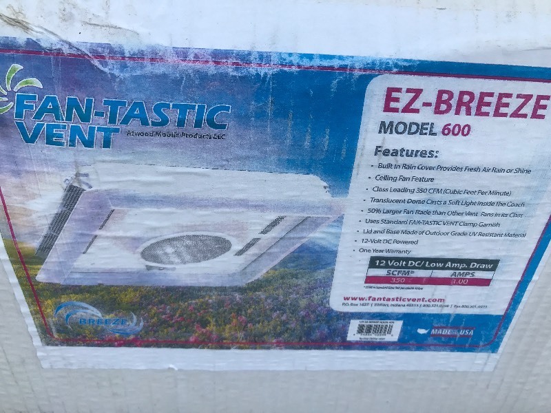 lot 17 image: New roof top vent with built-in exhaust fan great for RV work trailer use your imagination