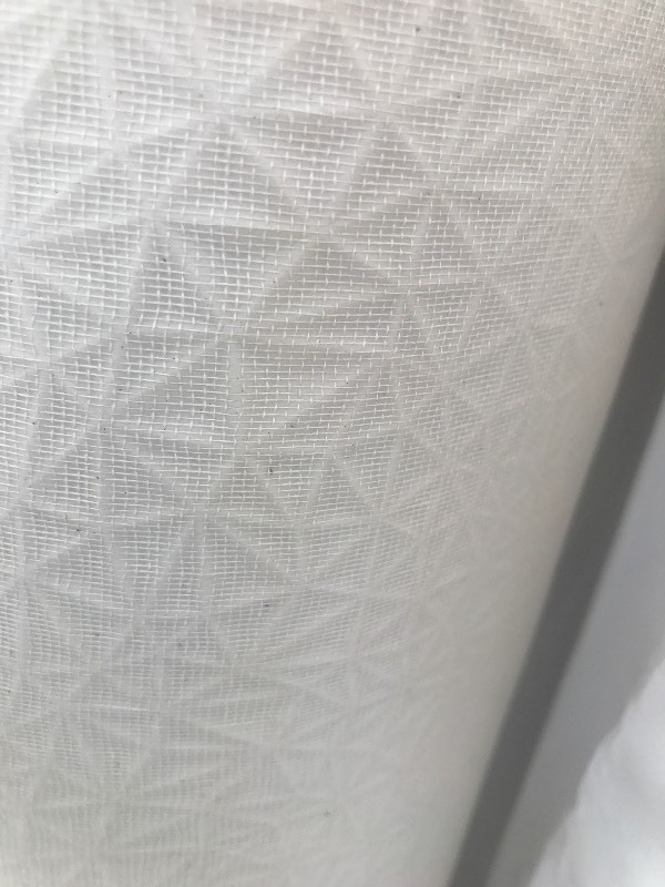 lot 86 image: Large roll of unique high dollar vinyl wall covering textured with design pattern 4 feet wide large role as pictured