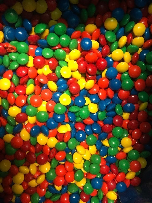 lot 9367 image: Bulk box of candy covered chocolate same style as M&Ms  25 pound box