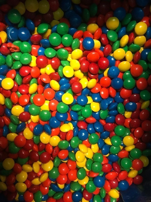 lot 9371 image: Bulk box of candy covered chocolate same style as M&Ms  25 pound box