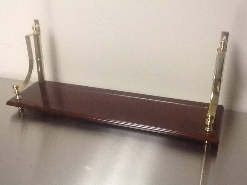 lot 217 image: Nice wood shelf with brass accents set on counter  or hanging from wall