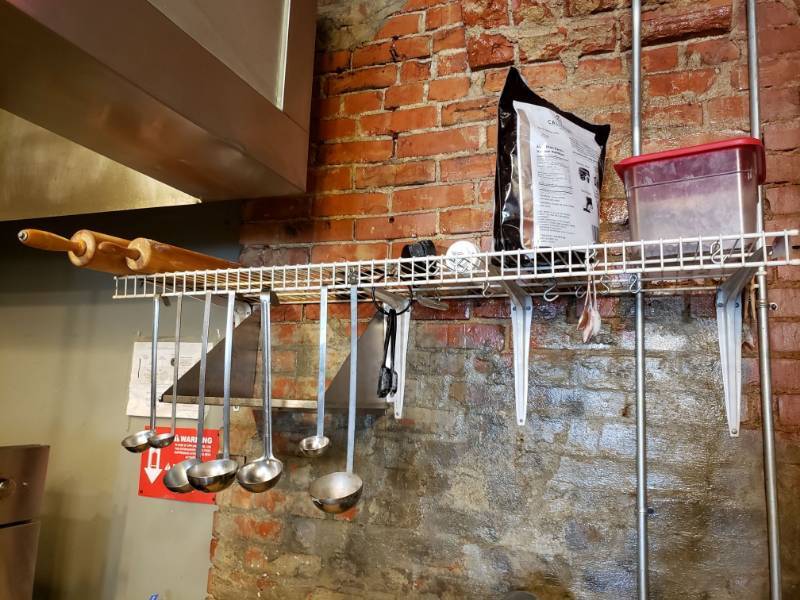 lot 3 image: (2) Shelves including Rolling Pins, Ladles and more