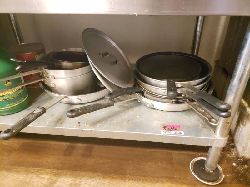 lot 8 image: (11) Various Pots and Pans with (2) lids.