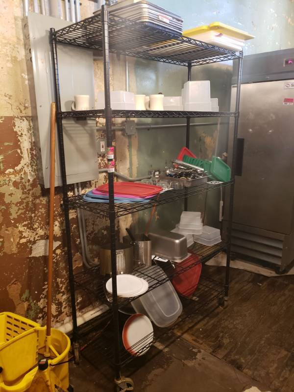 lot 49 image: Black Metal Rack on Wheels.