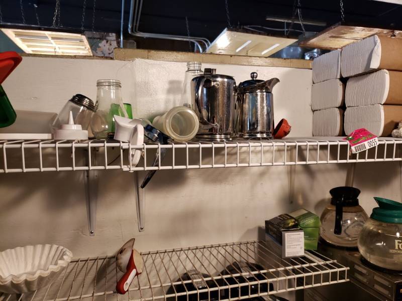 lot 55 image: (3) White Shelves with Various Items.