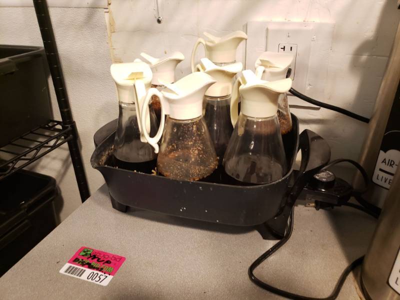 lot 57 image: (7) Syrup Dispensers with Warmer.