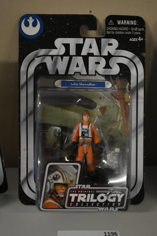 lot 1196 image: New In Package Star Wars Luke Skywalker Fighter Pilot Trilogy Collection Action Figure