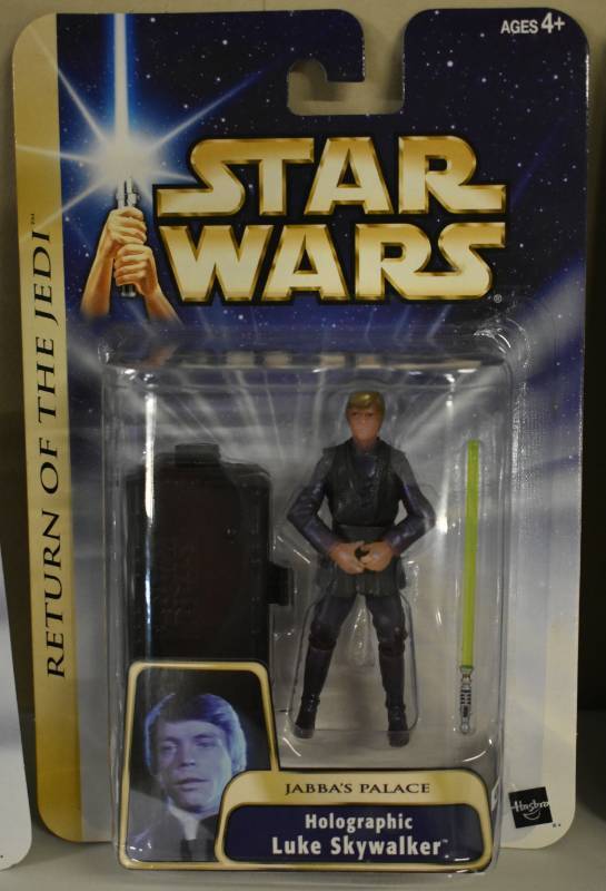 lot 1191 image: New In Package Star Wars Luke Skywalker Return of the Jedi Holographic in Jabbas Palace Action Figure