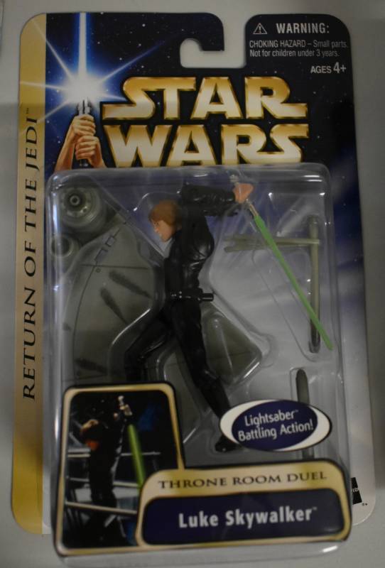 lot 1187 image: New In Package Star Wars Luke Skywalker Return of the Jedi Throne Room Duel Action Figure