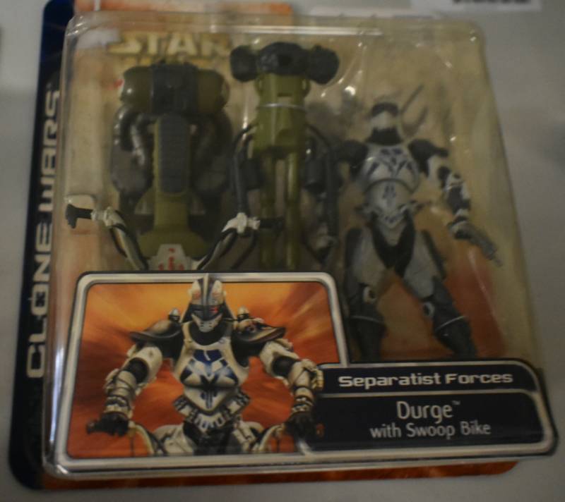 lot 1184 image: New In Package Star Wars Clone Wars Durge Figure with Swoop Bike Action Figure