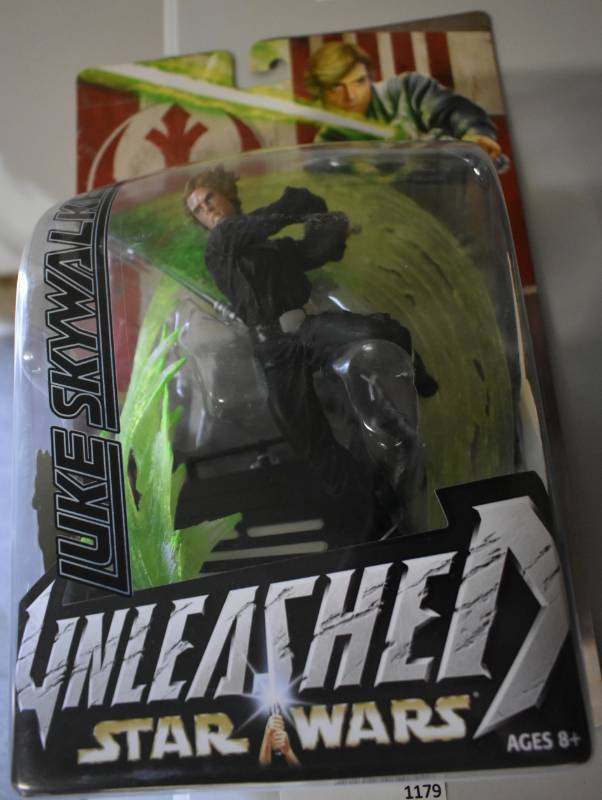 lot 1179 image: New In Package Hasbro Star Wars Luke Skywalker Unleashed Action Figure