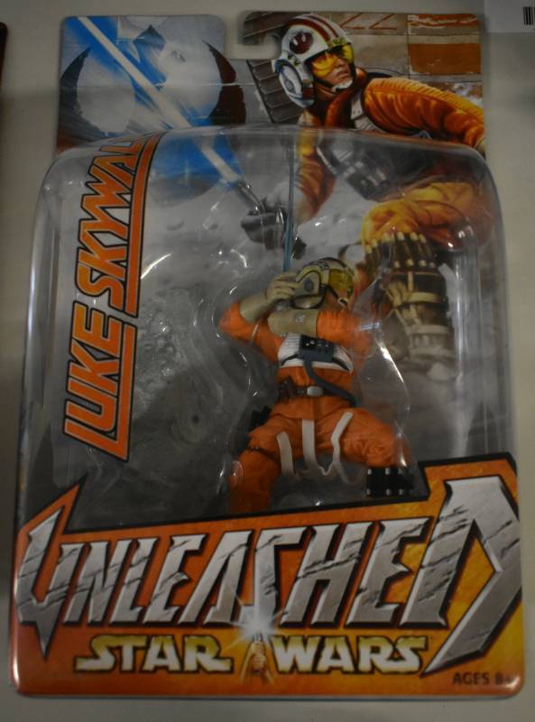 lot 1178 image: New In Package Hasbro Star Wars Luke Skywalker - Fighter Pilot Unleashed Action Figure