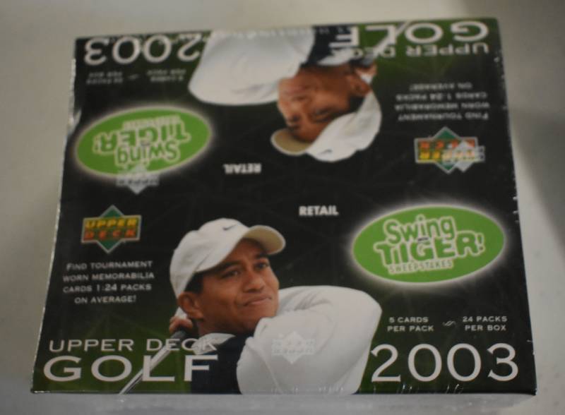 lot 1034 image: Sealed 2003 Upper Deck Golf Retail Box with 24 Packs and 120 Golf Cards - One RelicShirt Per Box - Possible Tiger Woods