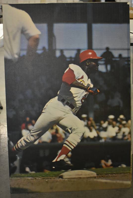 lot 1022 image: Original Vintage 1968 Sports Illustrated Lou Brock St. Louis Cardinals Full Sized Poster 24 in x 36 in - Dry Mounted on Foam Board Ready for Framing