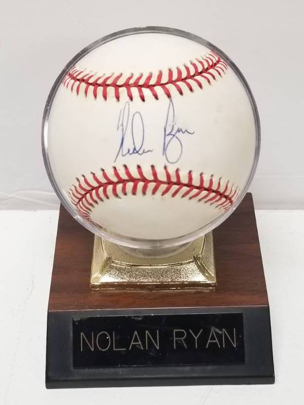 lot 1219 image: Nolan Ryan Autographed American League Official Baseball w Display Stand & COA