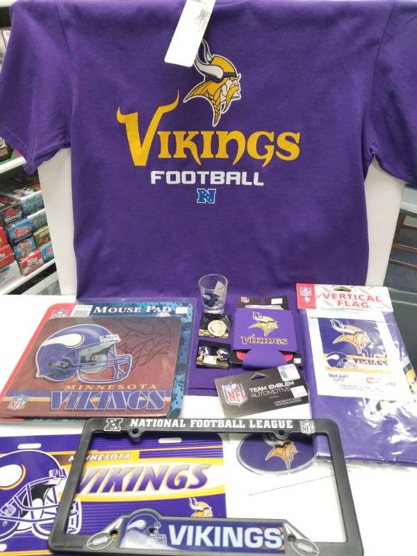 lot 1273 image: Minnesota Vikings Super Fanatic Official NFL Merchandise Lot w T-Shirt Large Flag Decal Plate & Cover