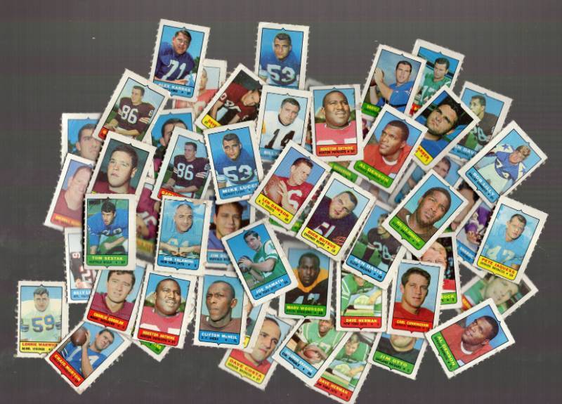 lot 1311 image: 1969 Topps Football Card Stamps Lot Over 50 w Len Dawson Joe Namath & Booklets