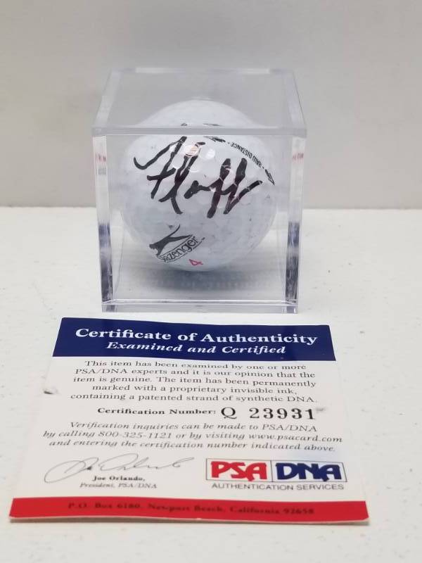 lot 1373 image: Mike Fluff Cowan Autographed PGA Golf Ball HOFer w Display Cube & COA