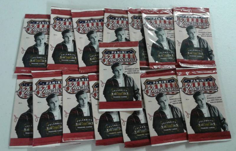 lot 1030 image: Lot of Fifteen Sealed Packs of 2011 Panini Americana With Possible Relics & Autographs - James Dean & Marilyn Monroe Possible
