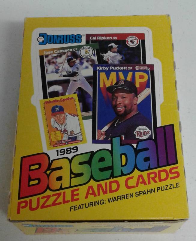 lot 1080 image: 1989 Donruss Wax Box with 36 Sealed Baseball Card Packs with Possible Rookies of Hall of Famers Ken Griffey, Randy Johnson, John Smoltz, Craig Biggio & More