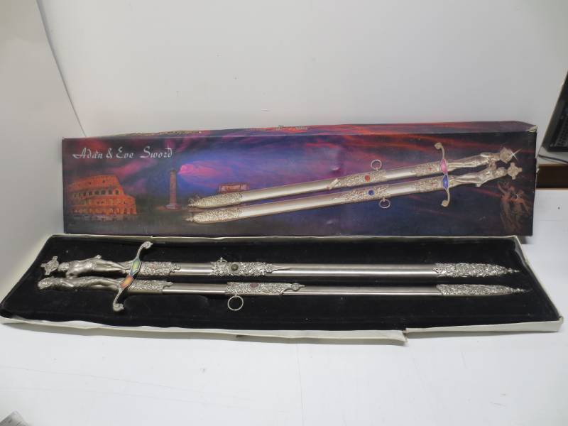 lot 1193 image: Adam & Eve Decorative Stainless Steel Swords