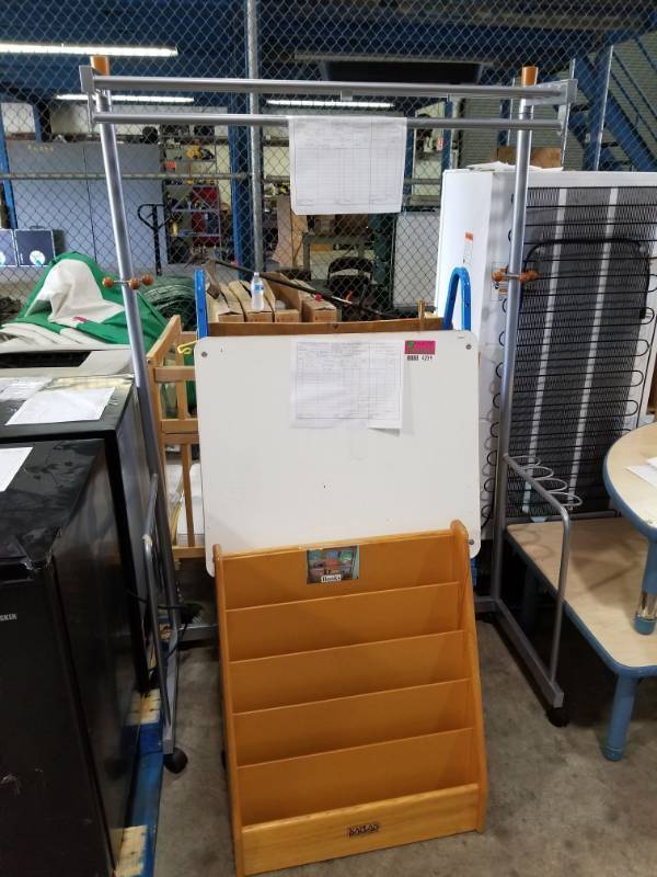 lot 4209 image: Small Angle Bookcase, Whiteboard on Wheels, Coat Hanger, Rolling Wood Crib