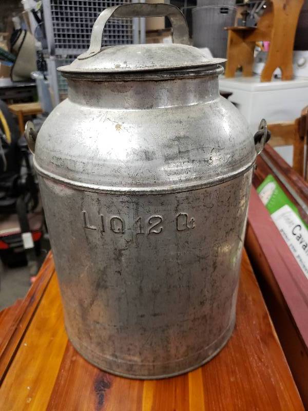 lot 10324 image: Vintage Liquid 12 Quart Jug