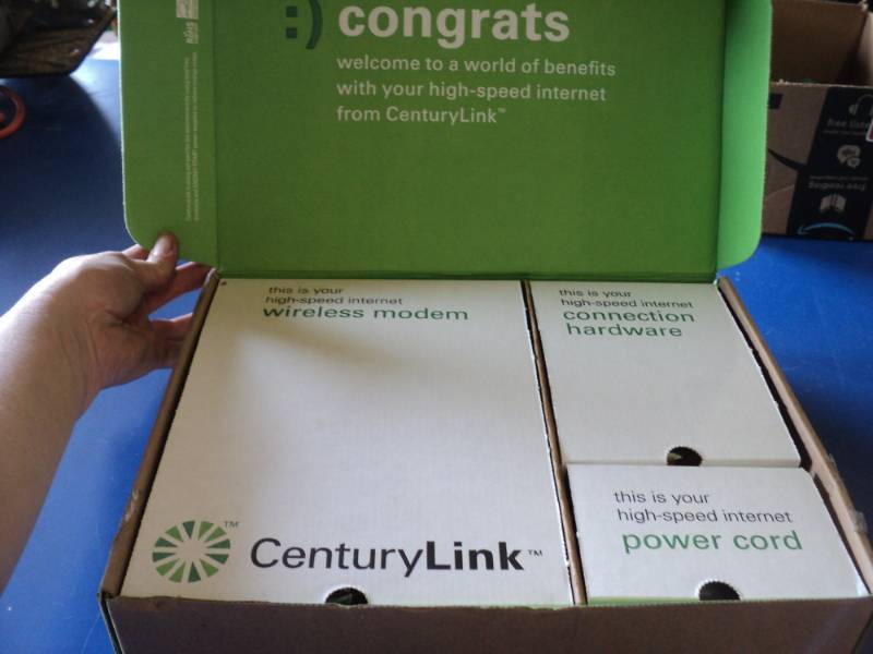 lot 7784 image: Century Link Internet Modem, hardware and power cord, open box, untested